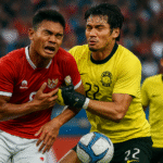 Insiden panas striker Timnas Indonesia Hokky Caraka benturan dengan kiper Malaysia di kualifikasi Piala Dunia 2026. Update lengkap dari Updatebola.
